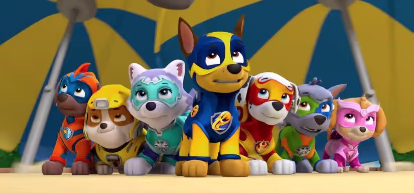 7 puppies in superhero costumes look concerned.