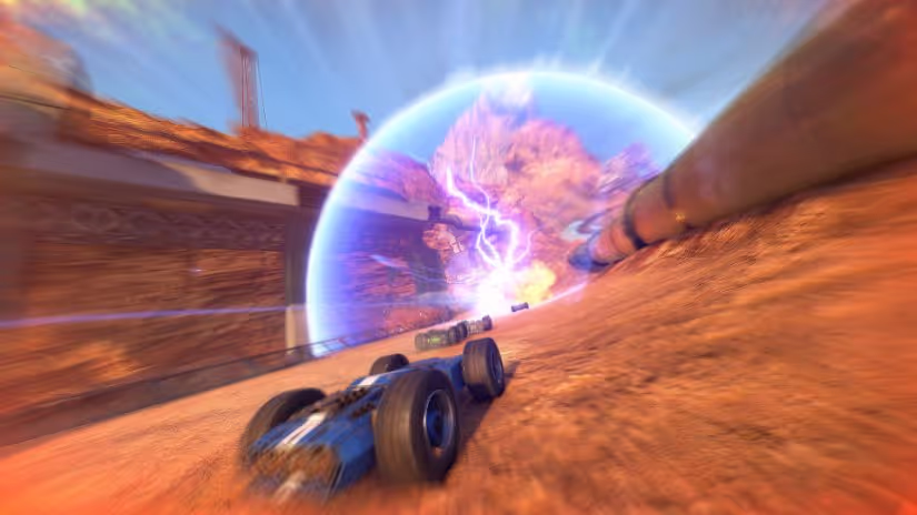 A sonic boom flares blue as a racecar speeds by.
