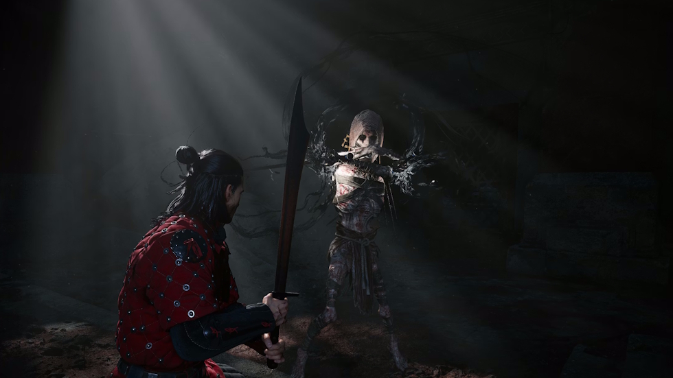 Coen raises his sword against a skeletal creature in a shaft of light
